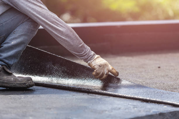 Professional Basement Waterproofing technician working in Ardmore, TN